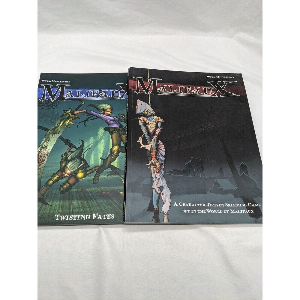 Lot Of (2) Malifaux Wyrd Miniatures Sourcebooks Core Rules Twisting Fates